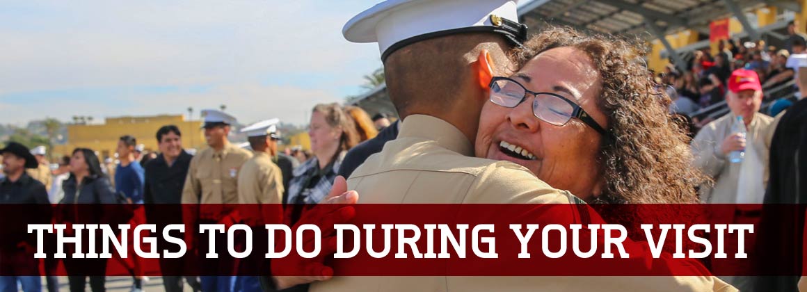 Image of mother hugging her new Marine.