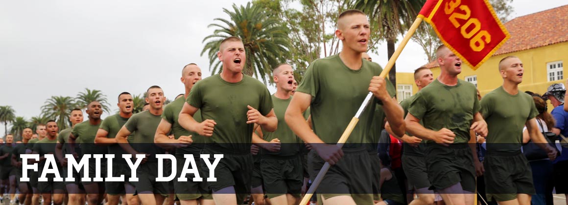 Image of graduating recruits during motivation run on Family Day.